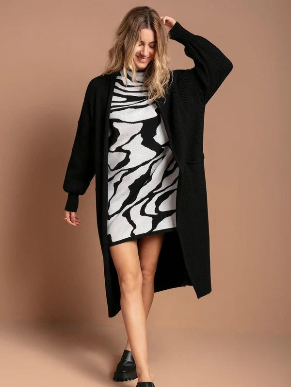 VESTIDO OVERSIZED ESTAMPADO COM GOLA ALTA E MANGAS DE CAVA QUADRADA BIAMAR