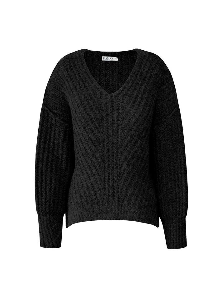 BLUSA DE PONTO TRANÇADO COM DECOTE EM “V” E PUNHOS CANELADOS BIAMAR