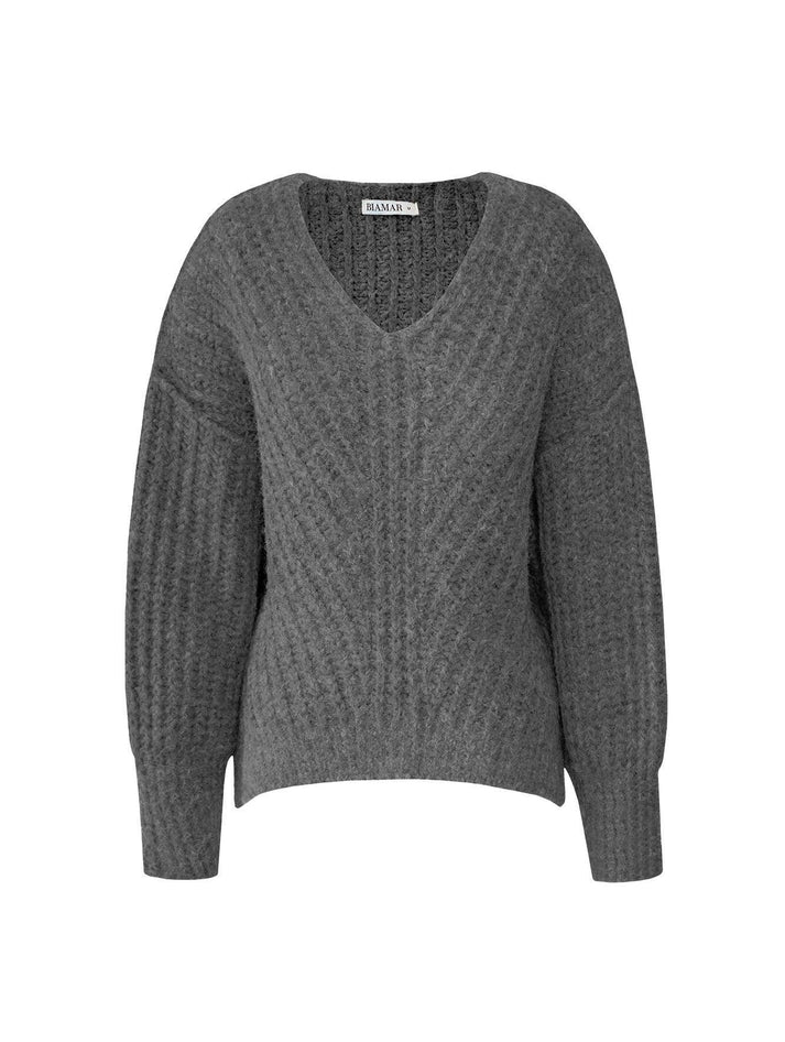 BLUSA DE PONTO TRANÇADO COM DECOTE EM “V” E PUNHOS CANELADOS BIAMAR