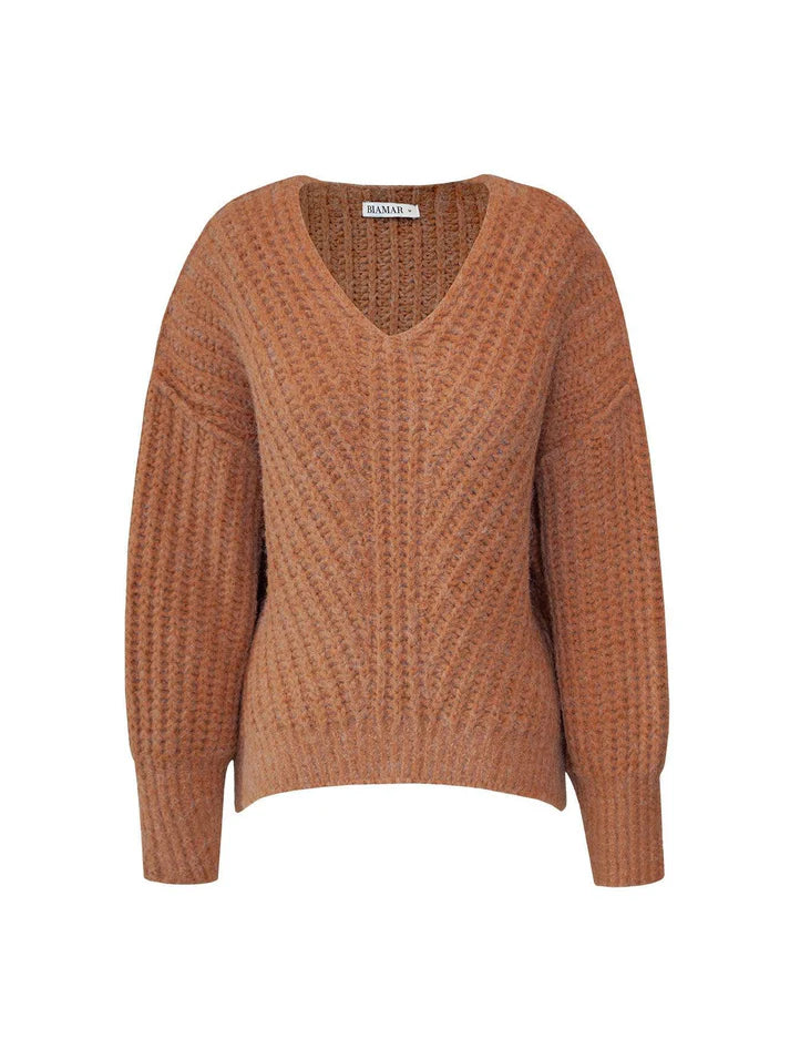 BLUSA DE PONTO TRANÇADO COM DECOTE EM “V” E PUNHOS CANELADOS BIAMAR