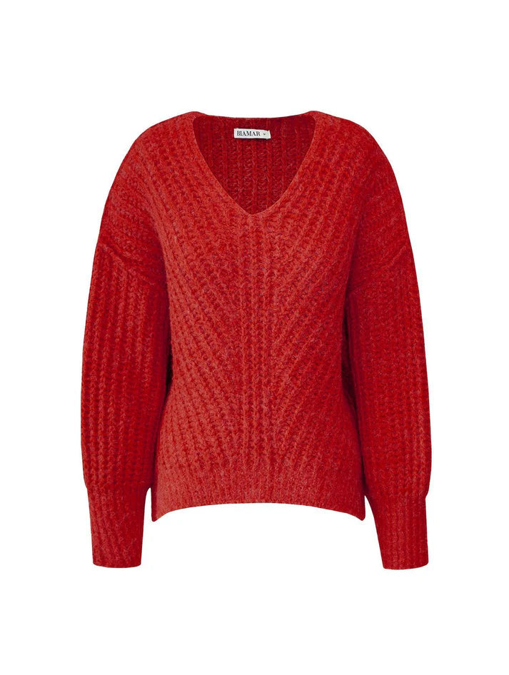 BLUSA DE PONTO TRANÇADO COM DECOTE EM “V” E PUNHOS CANELADOS BIAMAR