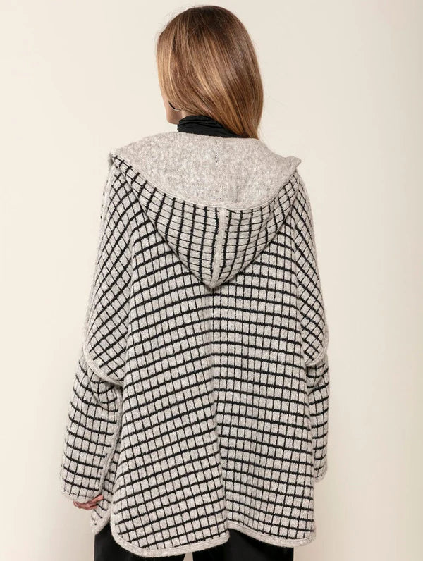 CASACO OVERSIZED REVERSÍVEL COM CAPUZ E SEM FECHAMENTO FRONTAL BIAMAR